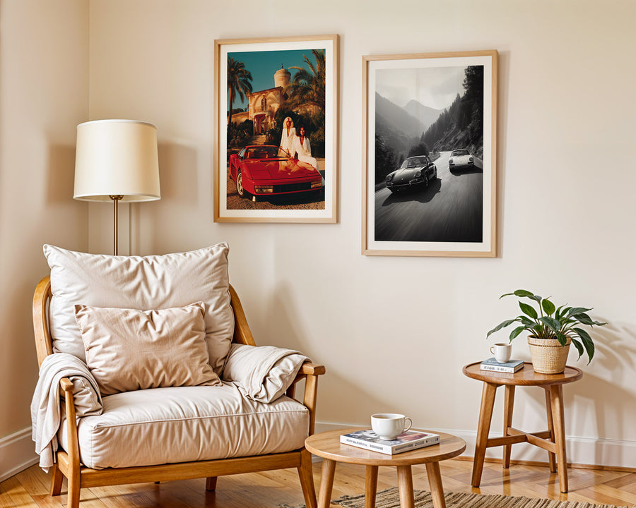 Living room with a wooden armchair, side table, and framed pictures on the wall.