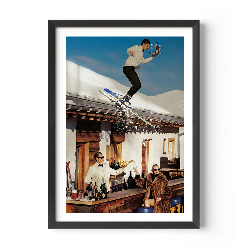 Framed photo of a person skiing on a roof with people below in a bar setting.