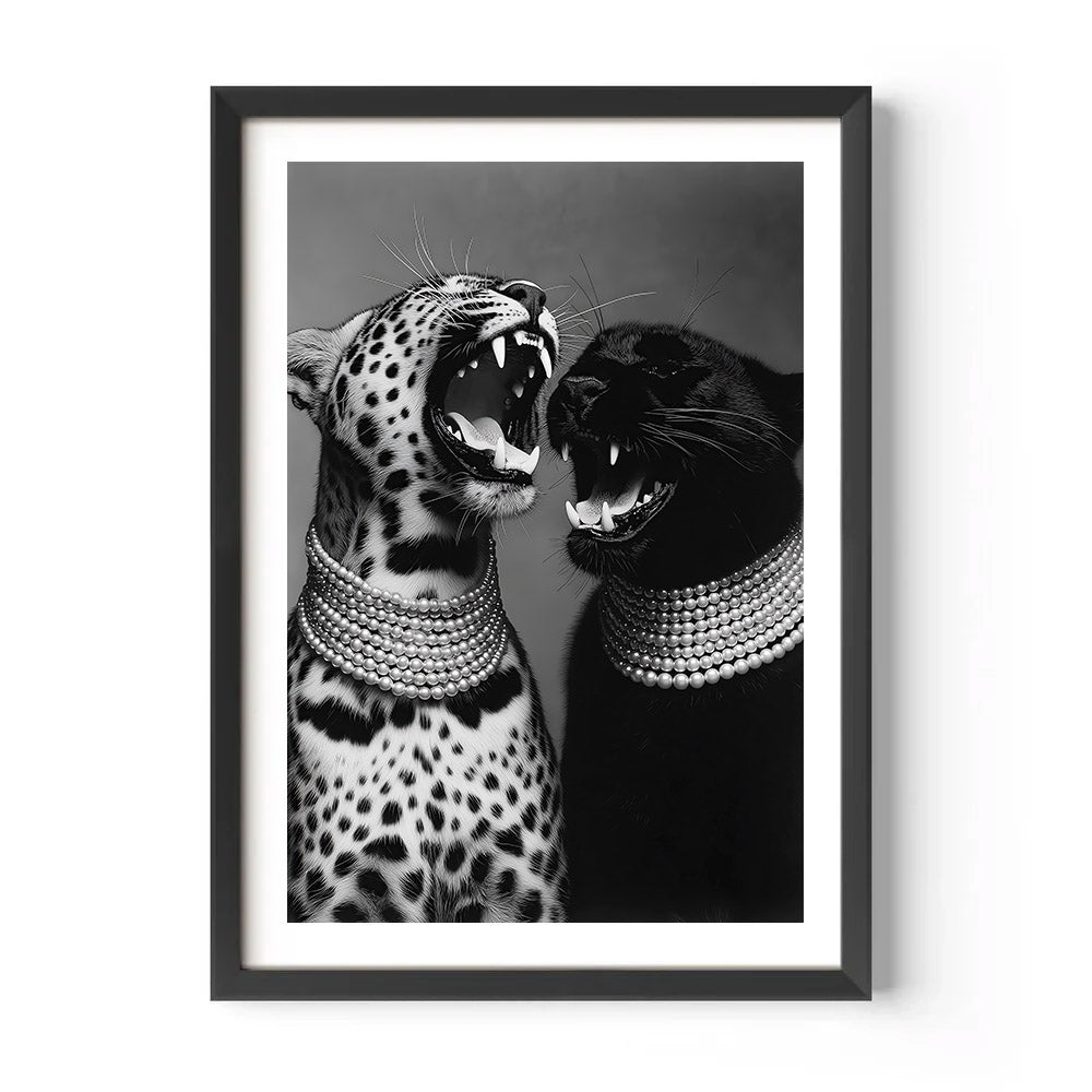 Framed black and white artwork of two leopards wearing pearl necklaces on a white background.