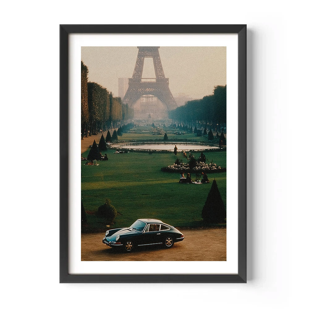 Framed artwork of a vintage car in front of the Eiffel Tower
