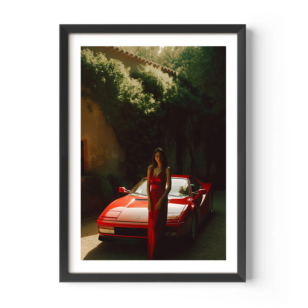 Framed artwork of a woman in a red dress standing next to a red sports car in a tunnel.