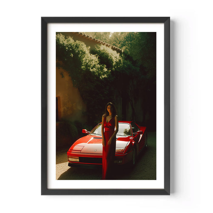 Framed artwork of a woman in a red dress standing next to a red sports car in a tunnel.