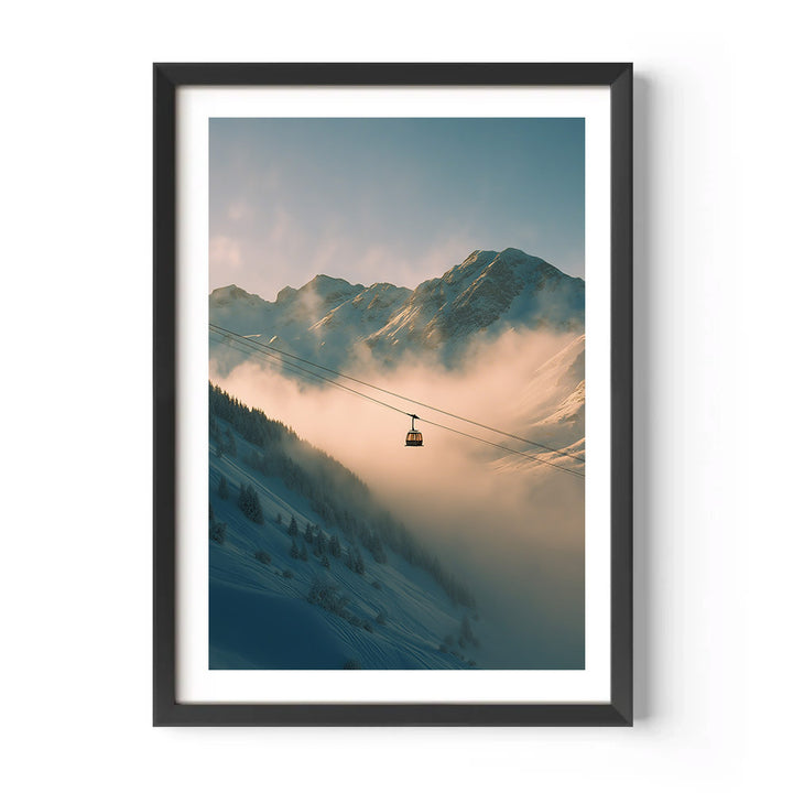 Framed photograph of a mountain landscape with a cable car at sunset.