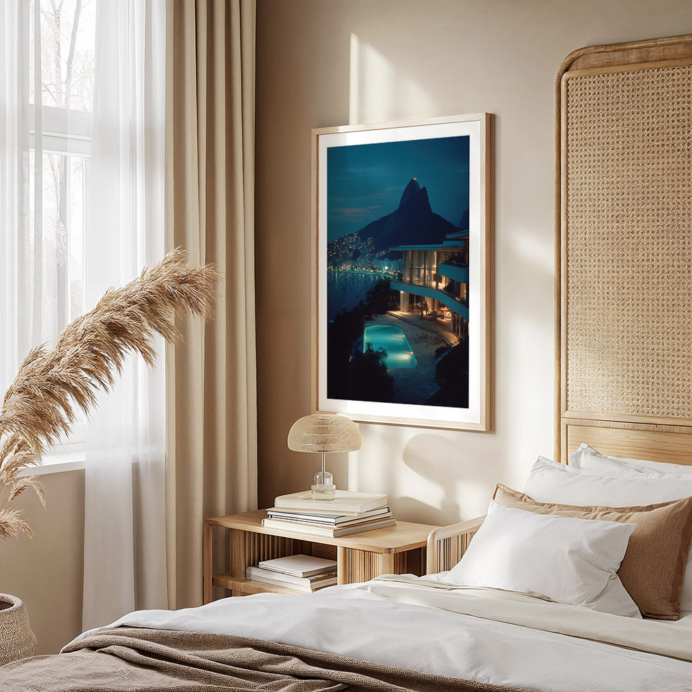 Modern bedroom with a bed, nightstand, and framed artwork on the wall.
