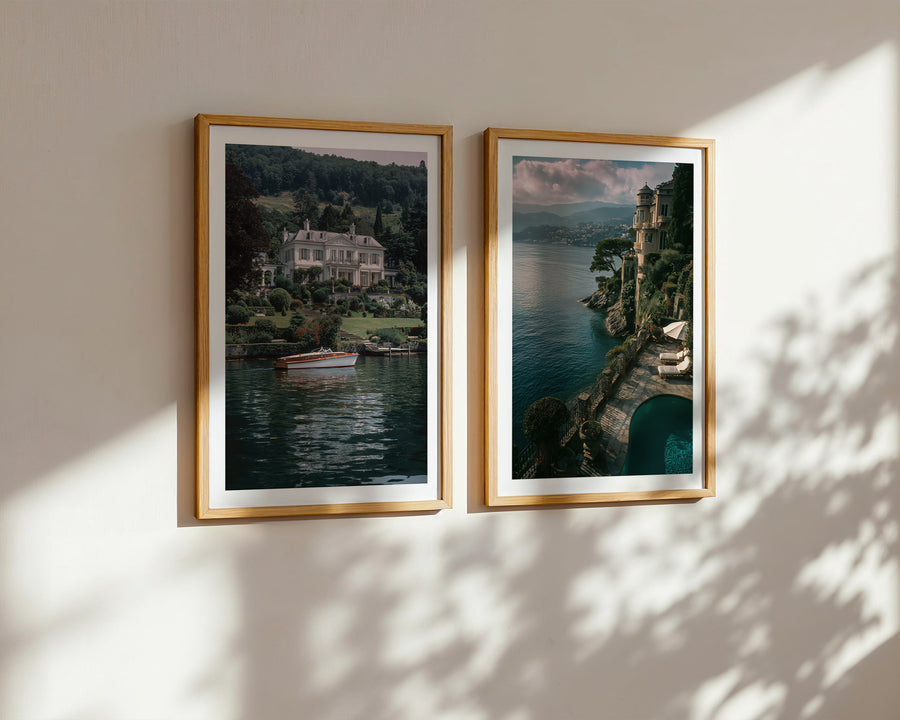 Two framed landscapes on a wall with sunlight casting shadows.