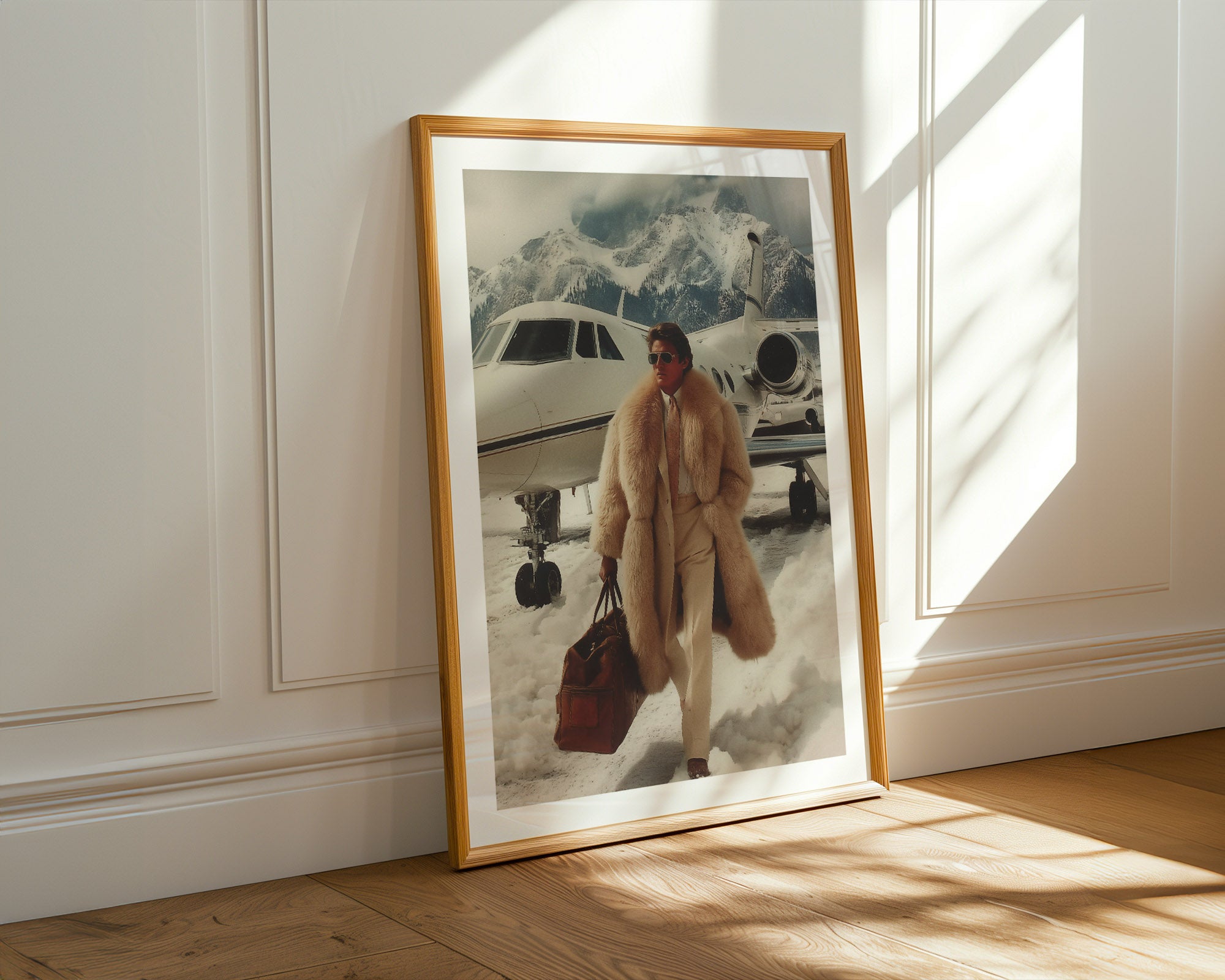 Framed photograph of a person in a fur coat standing next to an private airplane in Gstaad on a snowy landscape.