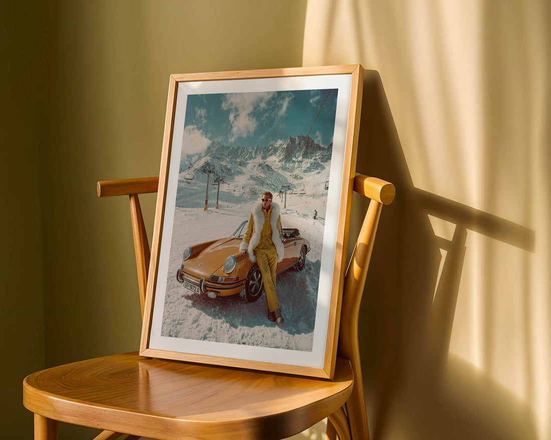 Framed photograph of a person in a snowy landscape with a car, displayed on a wooden chair.
