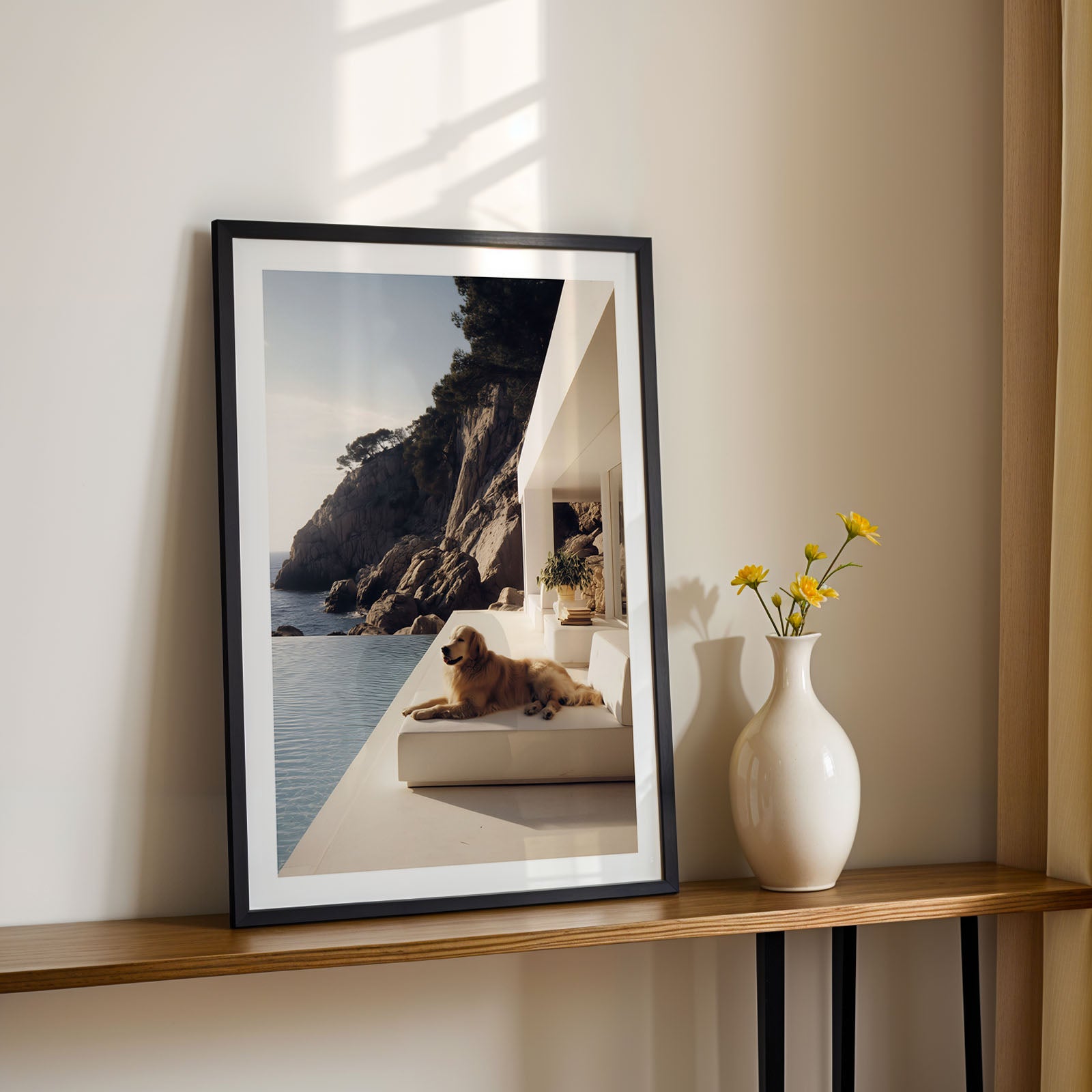 Framed photograph of a dog by a pool with a vase of flowers on a shelf.