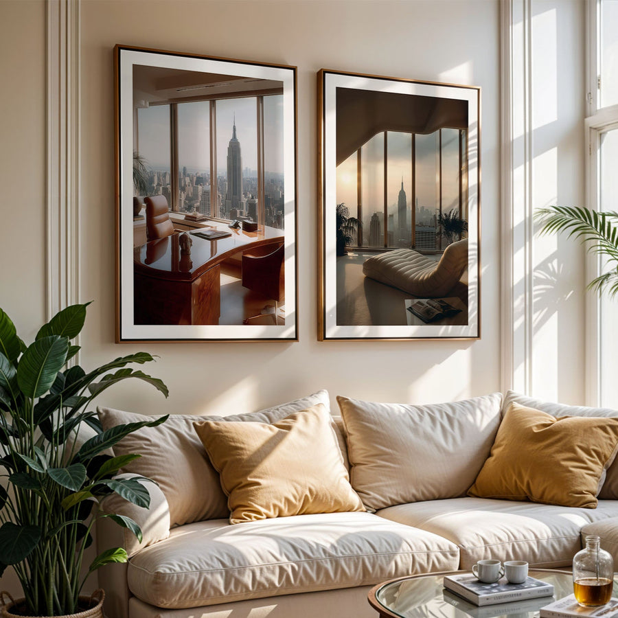 Living room with a beige sofa, decorative pillows, and framed cityscape art on the wall.