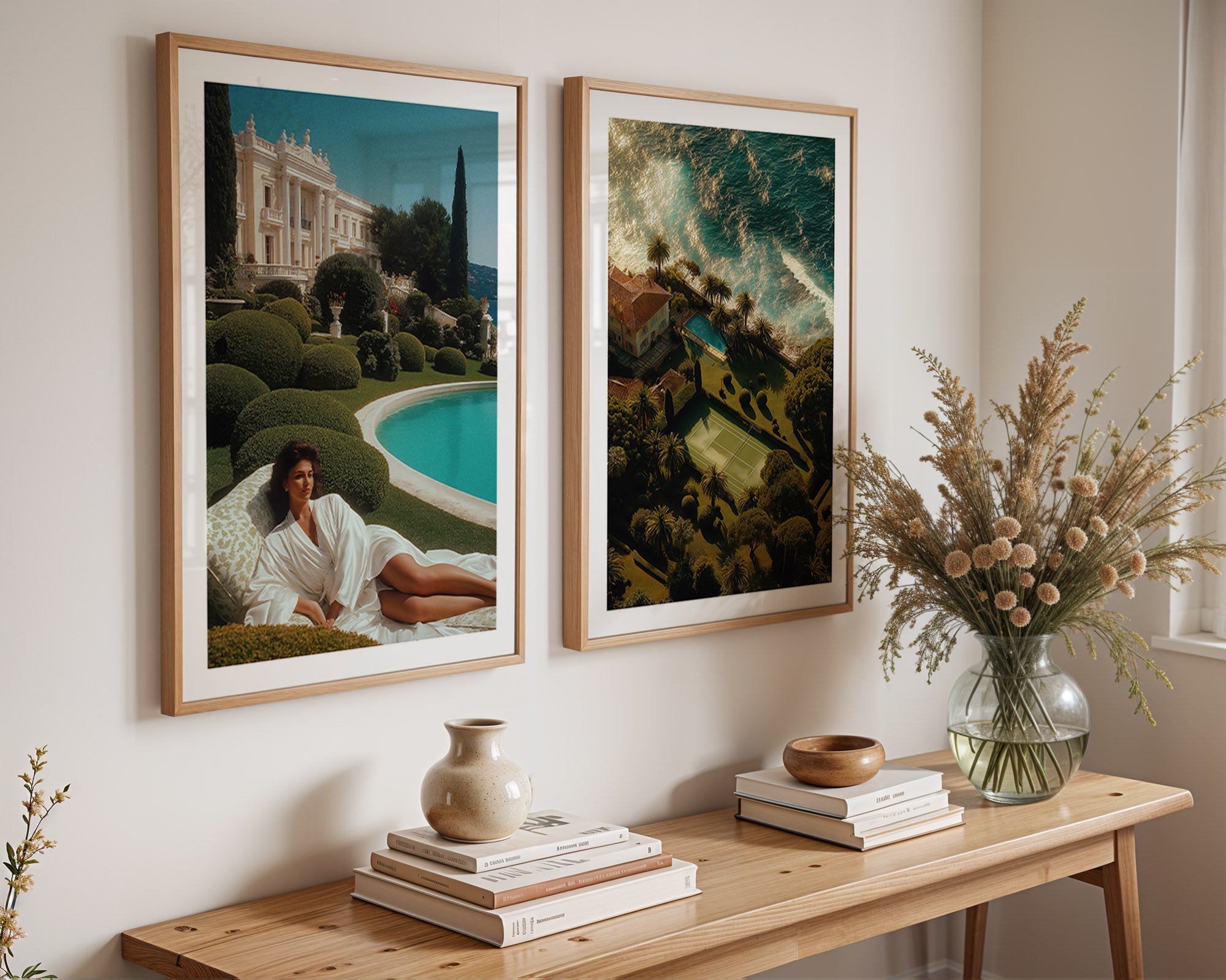 Two framed artworks on a wall above a wooden console table with decorative items.