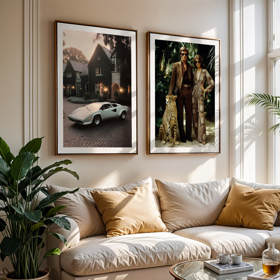 Living room with a white sofa, decorative pillows, and framed artworks on the wall.