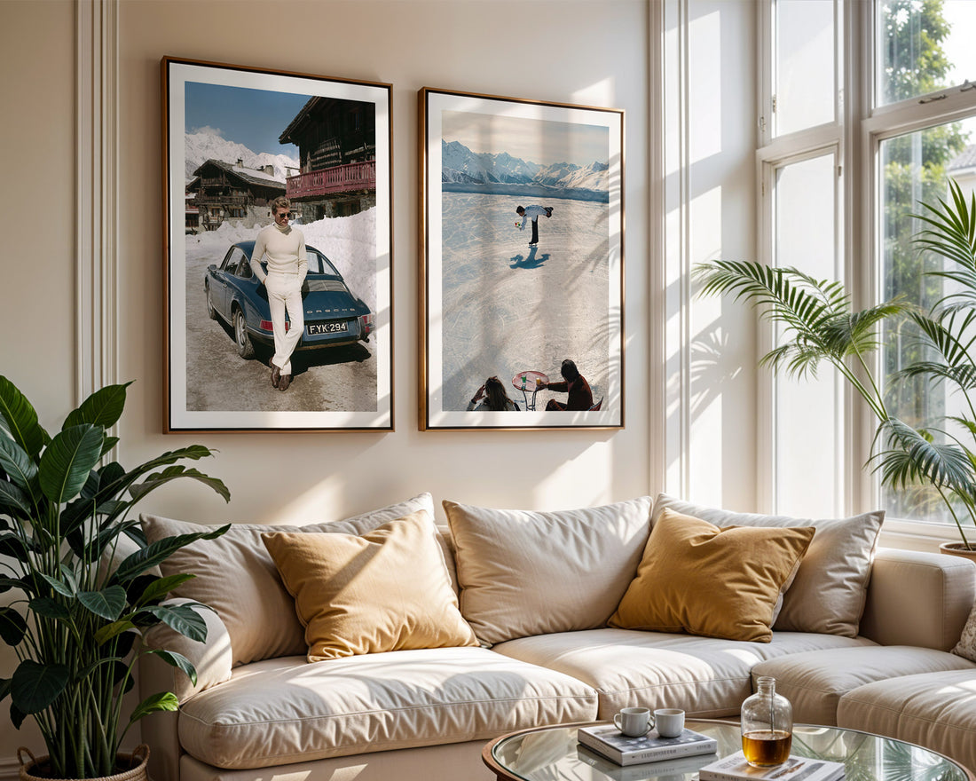 Living room with a beige sofa, decorative pillows, and framed artwork on the wall.