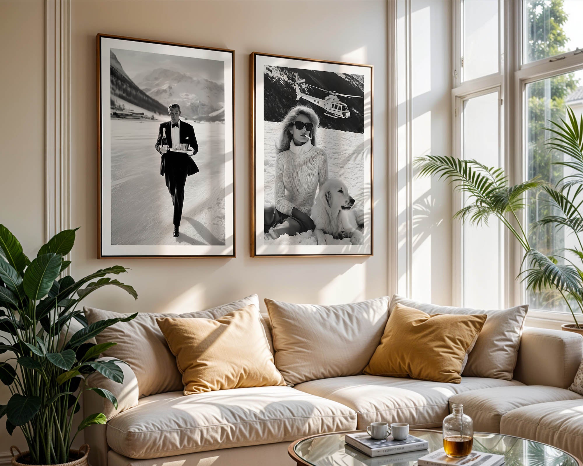 Living room with a beige sofa, framed black and white photos, and plants.