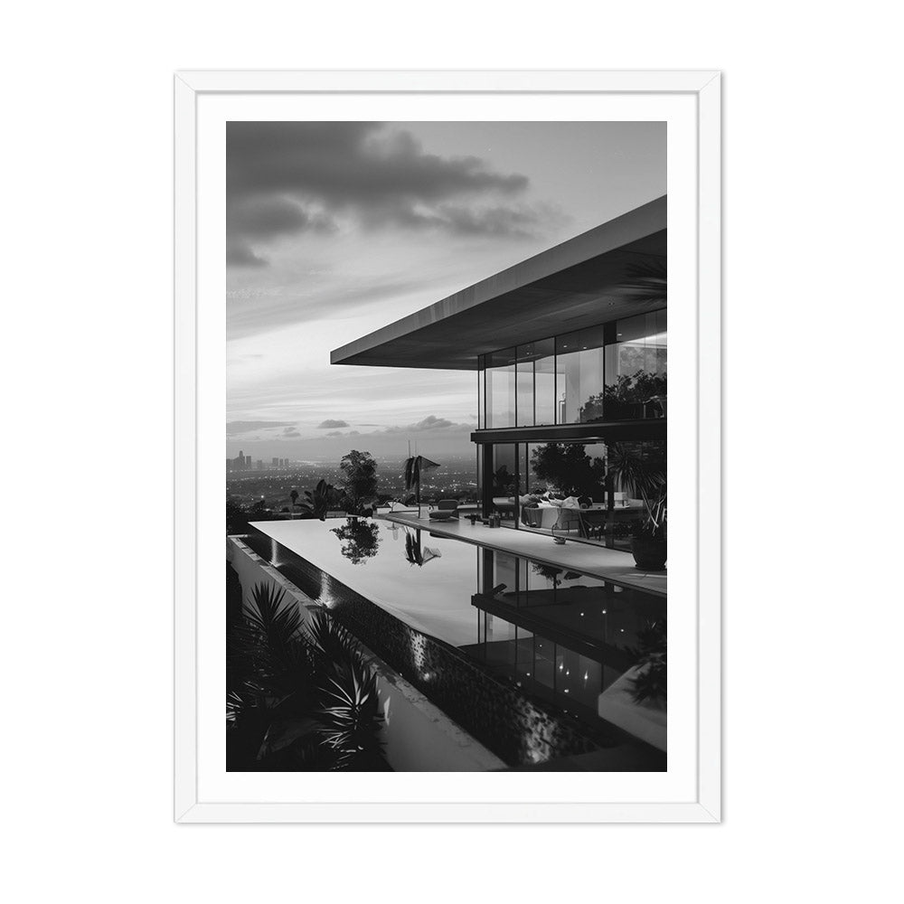 Modern house with an infinity pool and scenic view, framed in white.
