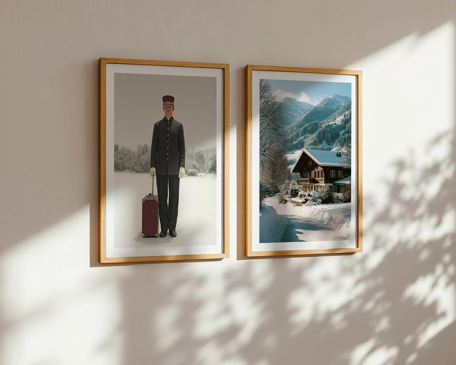 Two framed pictures on a wall, one with a person in a uniform and suitcase, the other with a mountain landscape.