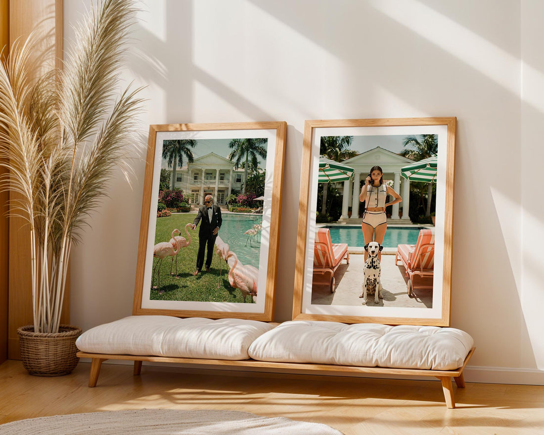 Two framed photographs of a pool scene on a wall with a plant and bench in the foreground.