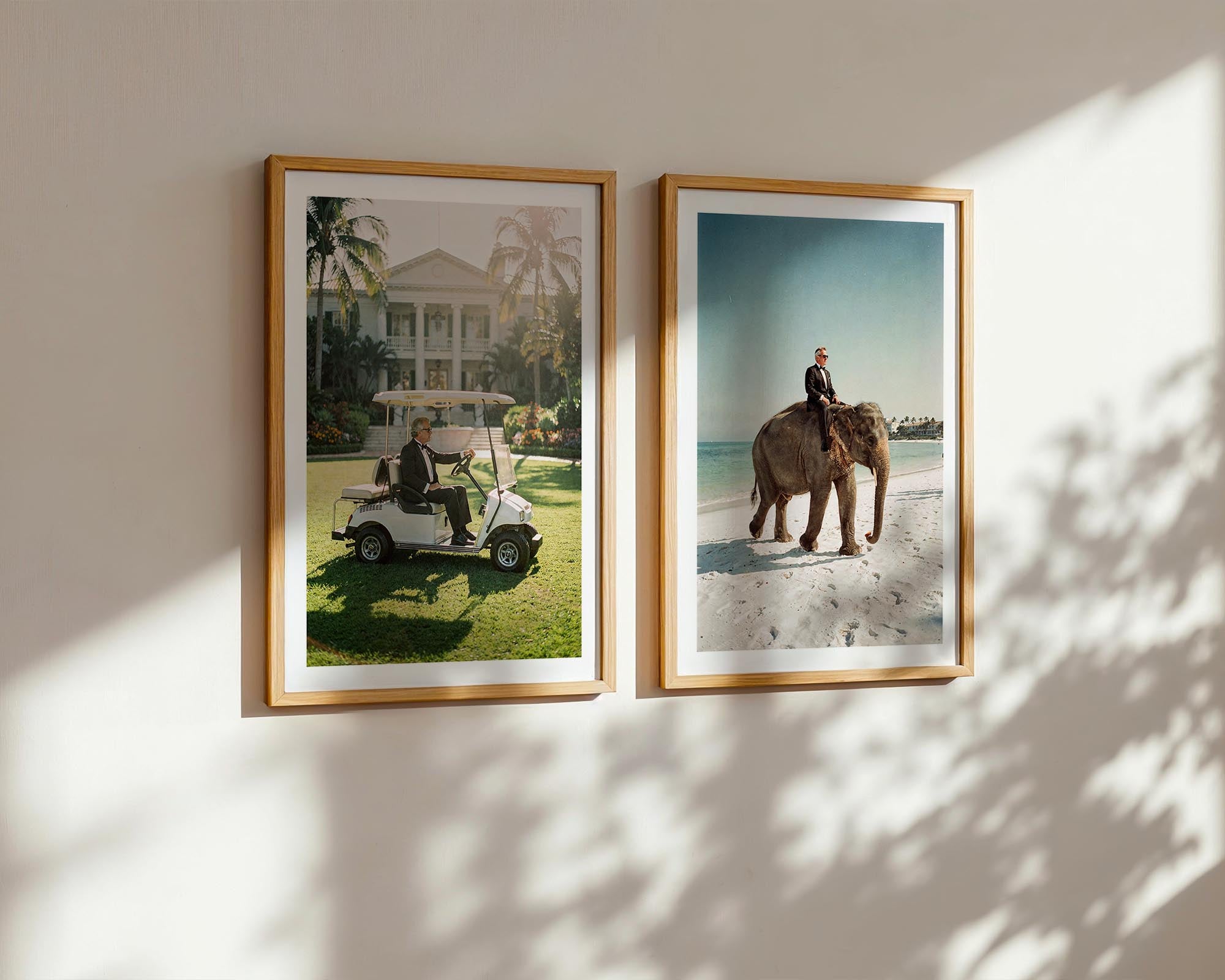 Two framed photographs on a wall, one of a golf cart and another of an elephant, displayed side by side.