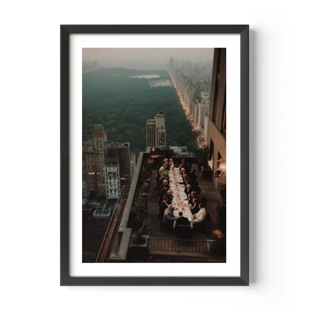 Framed photograph of a cityscape with people dining on a rooftop.