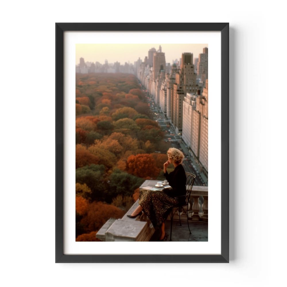 Framed artwork of a woman sitting on a rooftop with a view over Central Park NYC.