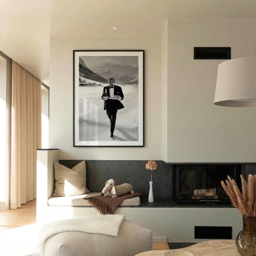 Modern living room with a framed picture of a person in a tuxedo on the wall.