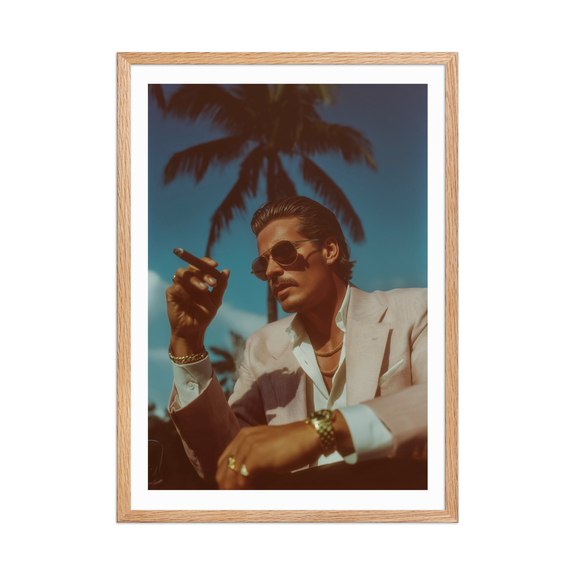Framed artwork of a man smoking a cigar with palm trees in the background