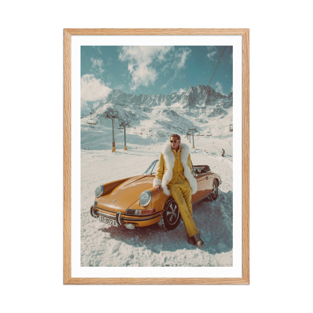 Framed photograph of a person in winter attire sitting next to a vintage car in a snowy mountain setting.