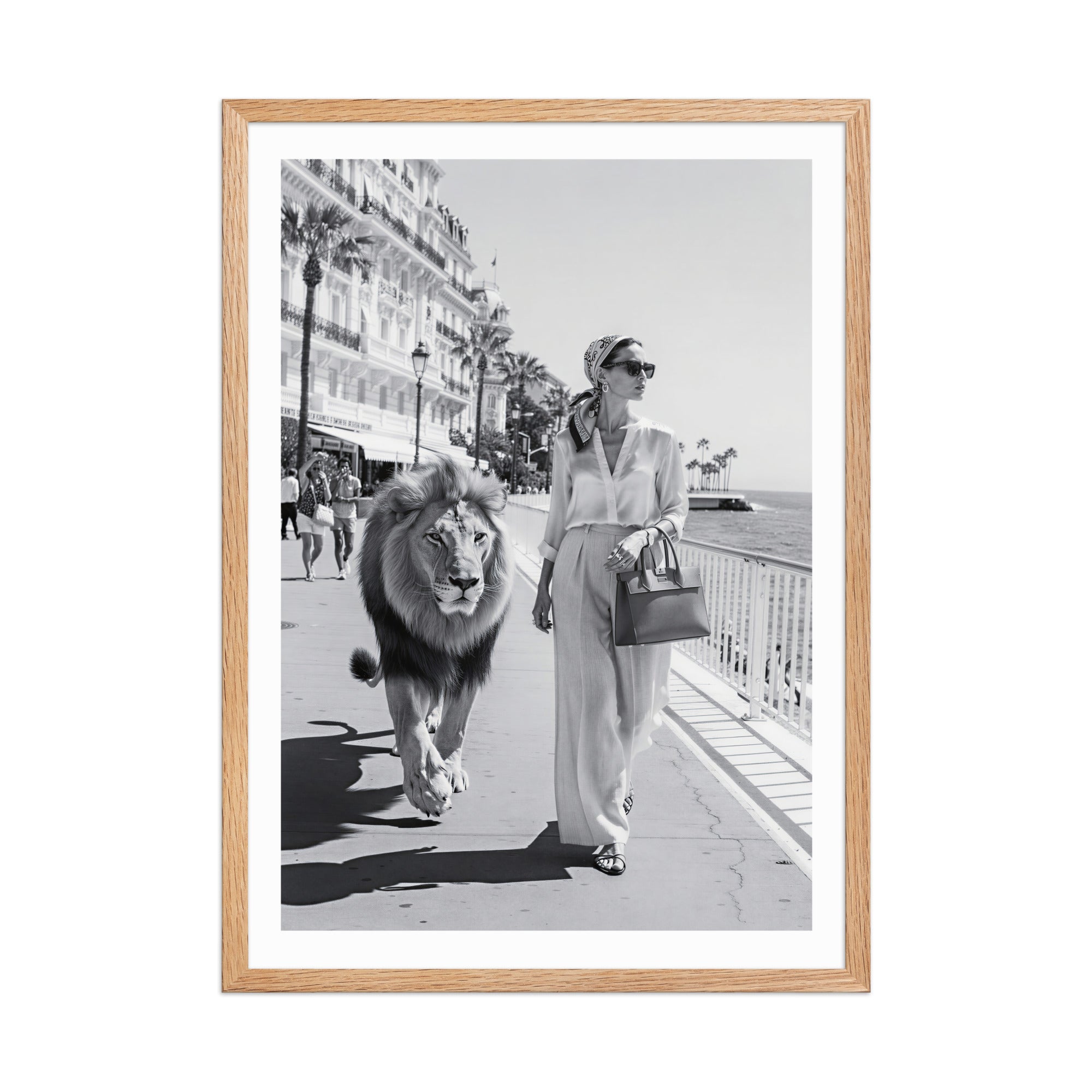 Framed black and white photo of a woman walking a lion on a city street.