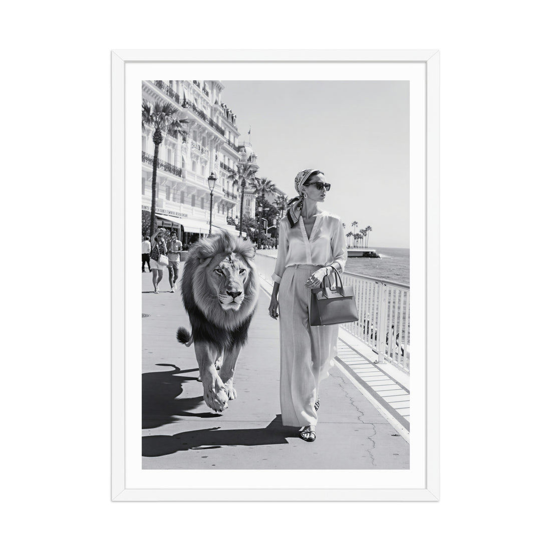Woman walking a lion on a city street with palm trees and buildings in the background.