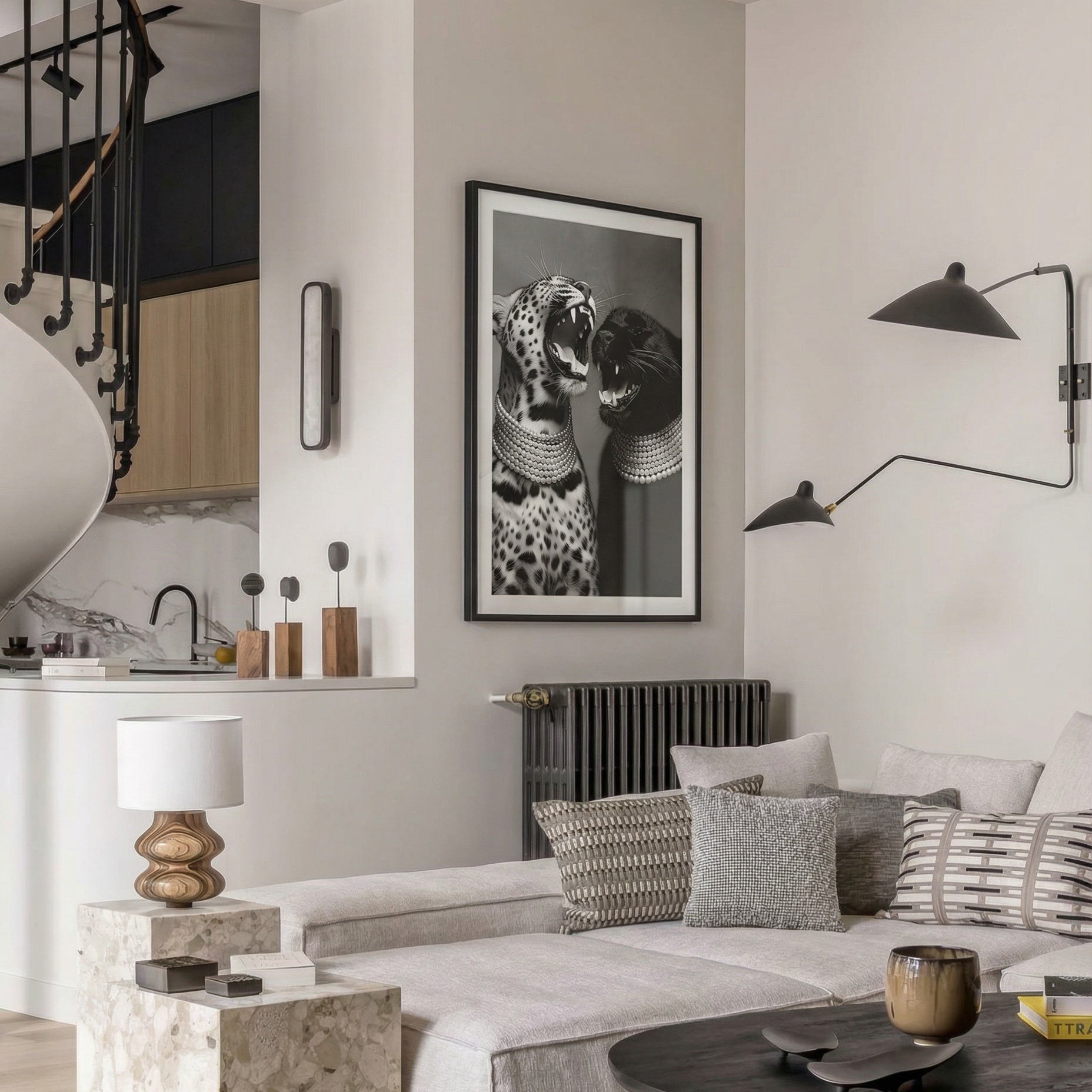 Modern living room with a sofa, coffee table, and wall art.