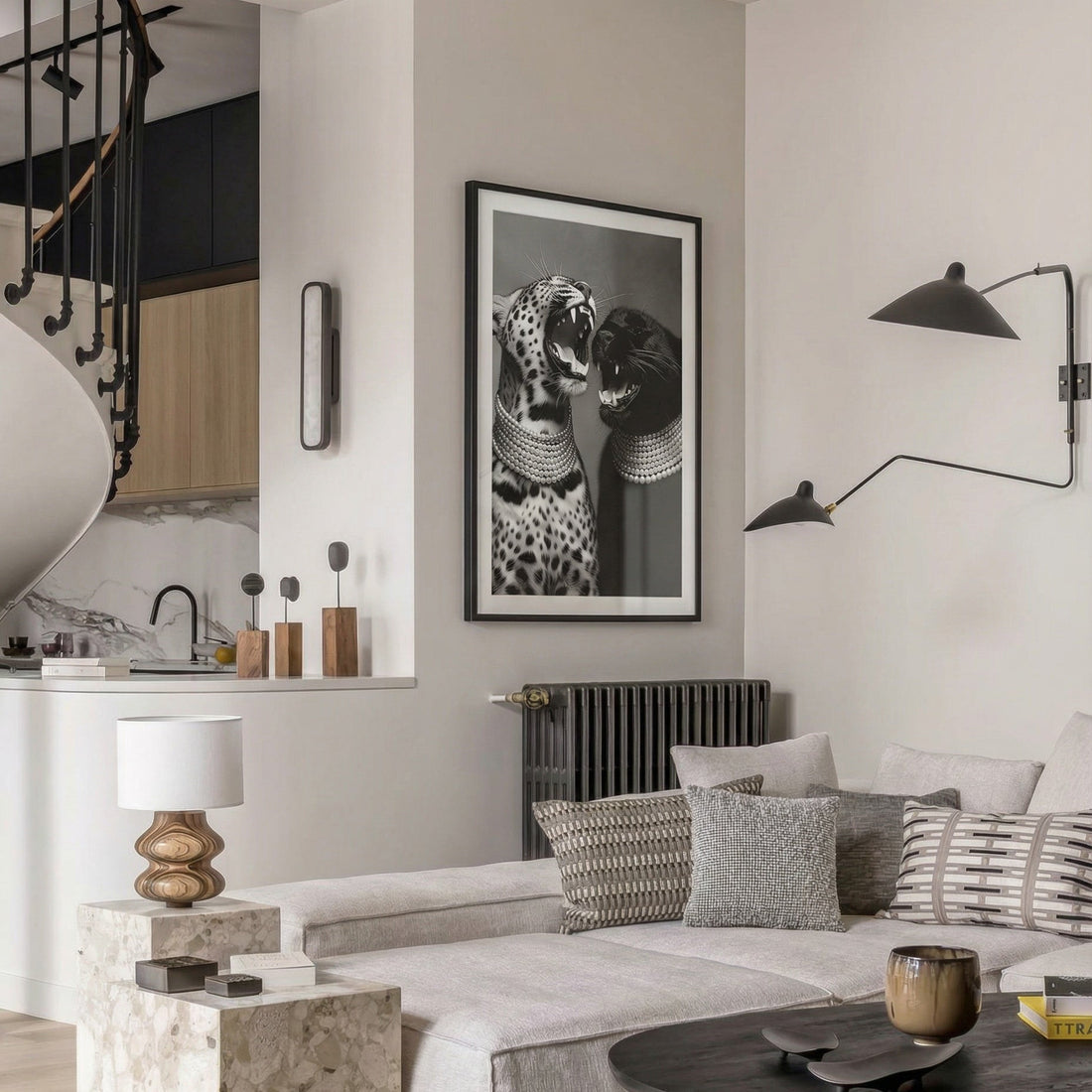 Modern living room with a sofa, coffee table, and wall art.